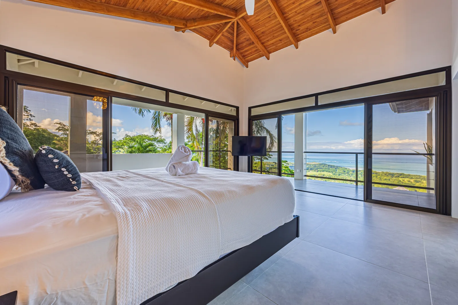 Casa Ballena &mdash; the primary suite, glazed to the ocean