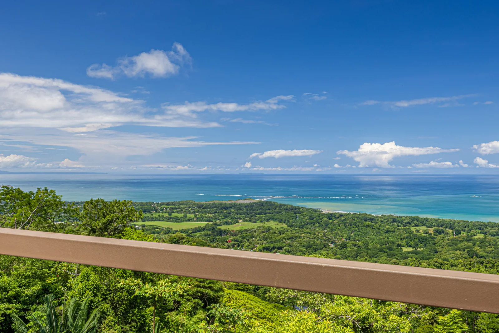 Casa Ballena &mdash; the view down the coast from the terrace rail