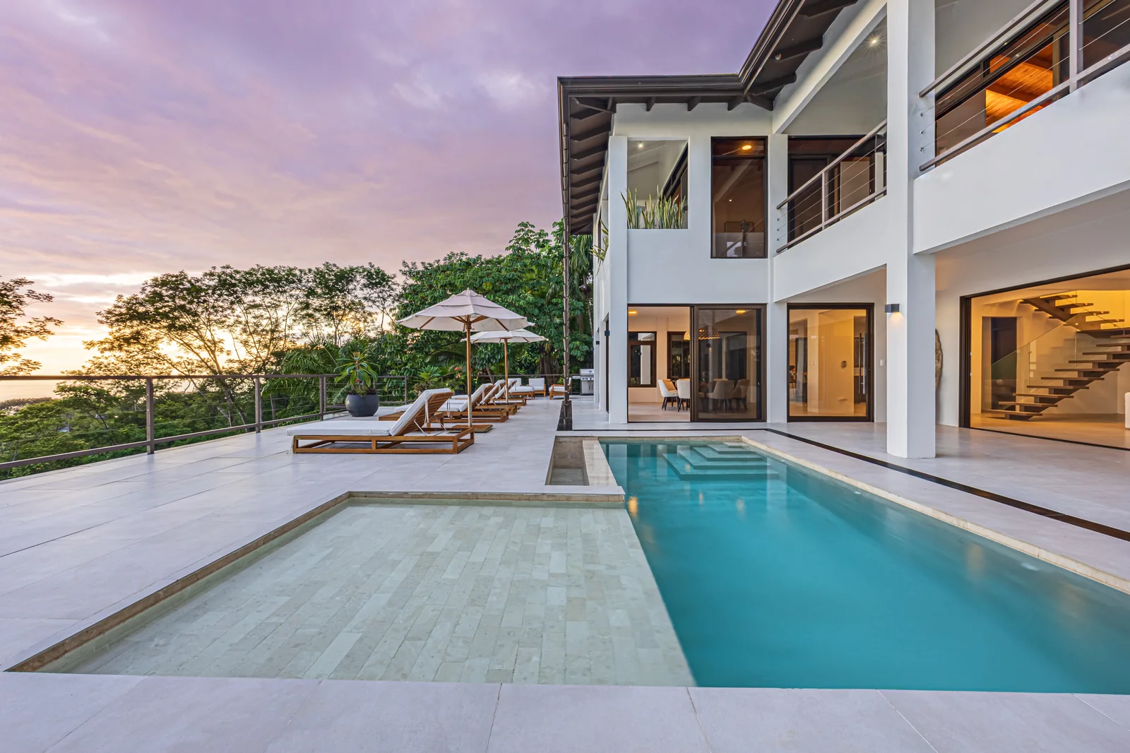 Casa Ballena &mdash; sunset over the pool and the coast