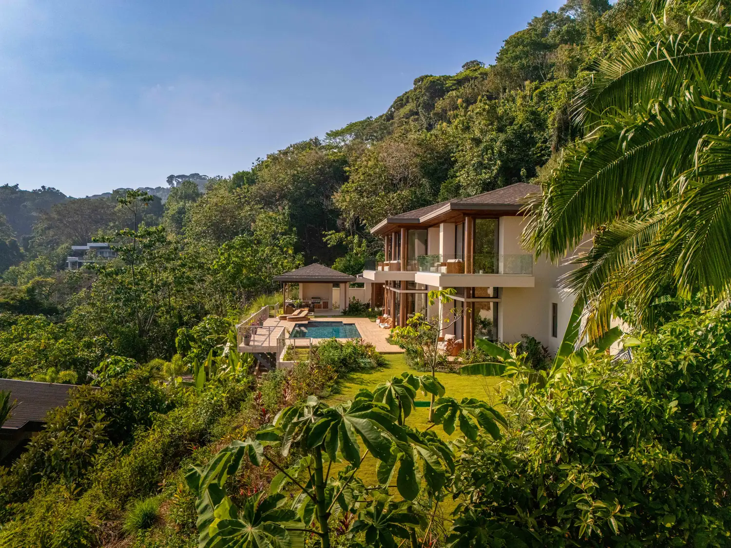 Casa Bella Vi&ntilde;a &mdash; the house and pool from the air, set into the hillside