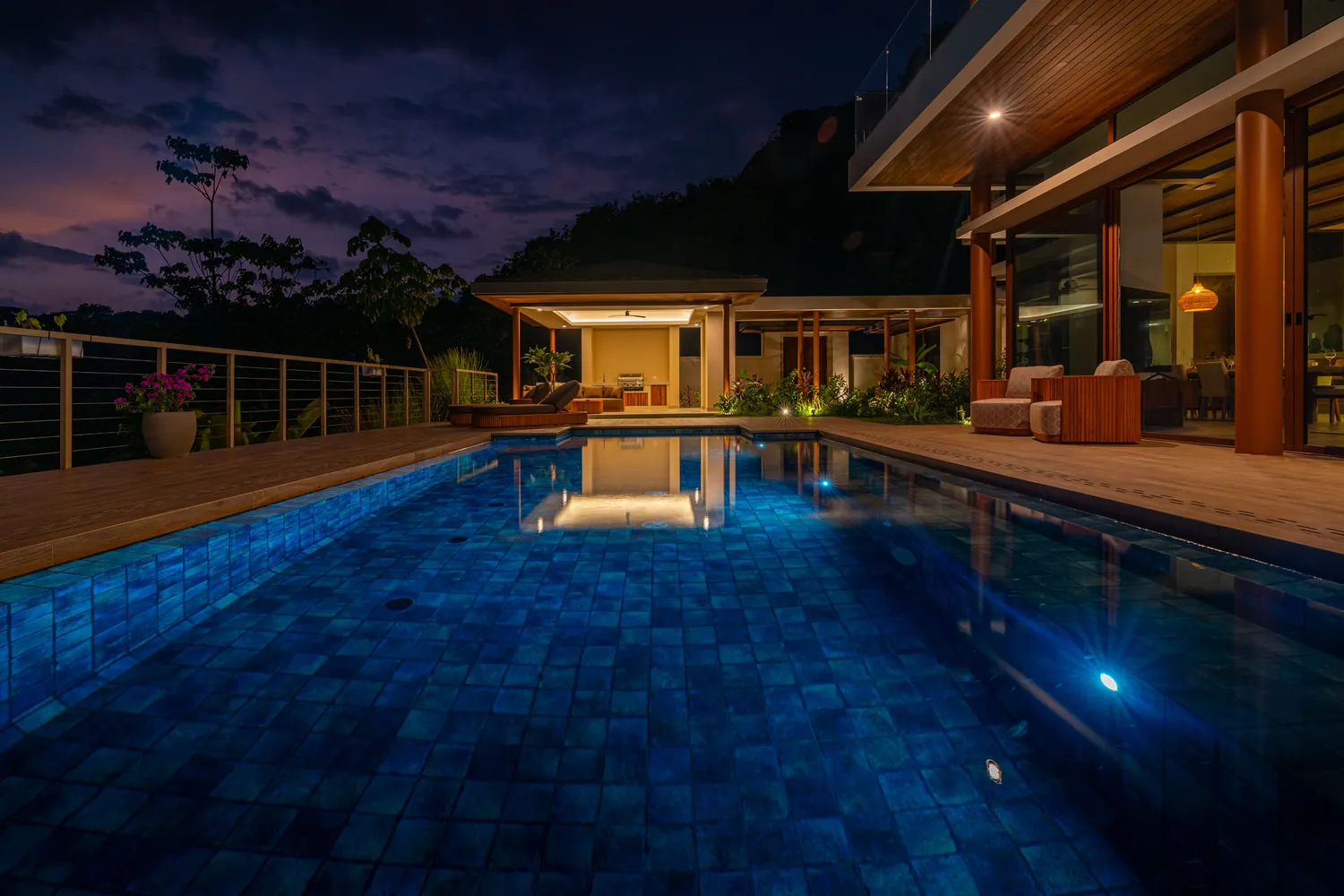 Casa Bella Vi&ntilde;a &mdash; the pool at dusk, lit from within