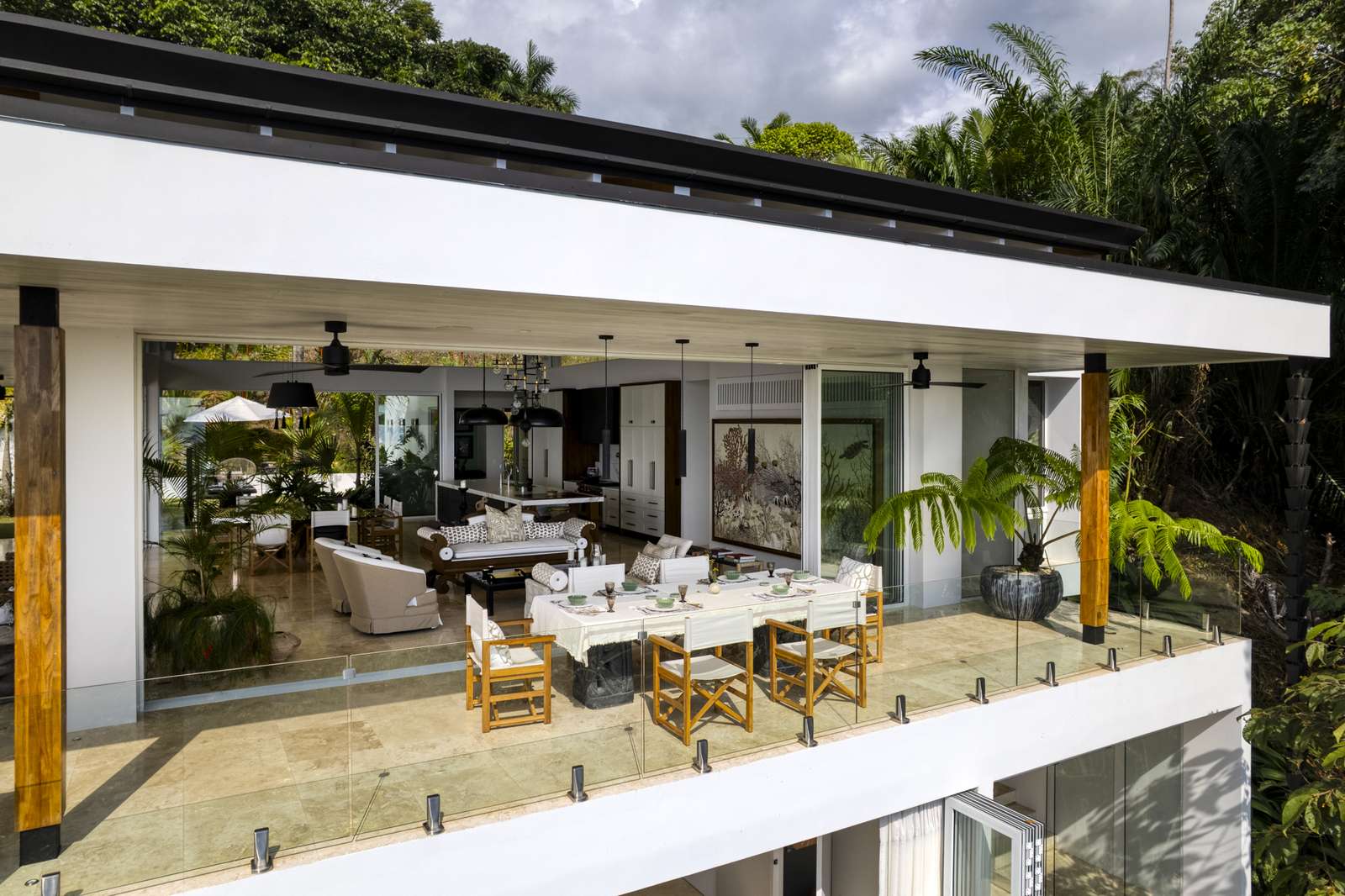 The house from the garden, its terraces stepping toward the view