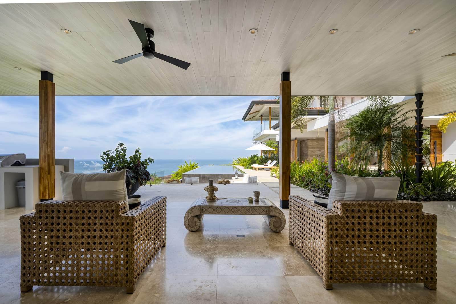 The covered terrace, furnished for the view