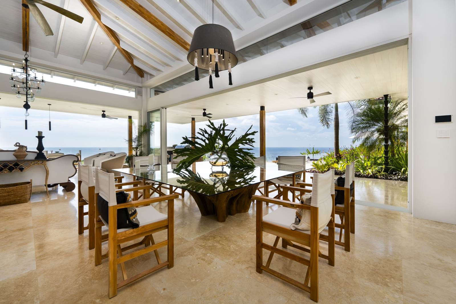 Living and dining together beneath the 17-foot vault