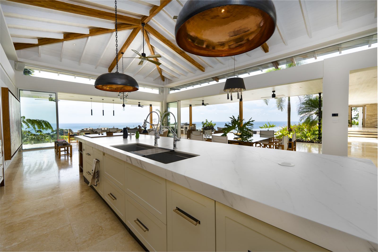 The seventeen-foot kitchen island, topped in porcelain