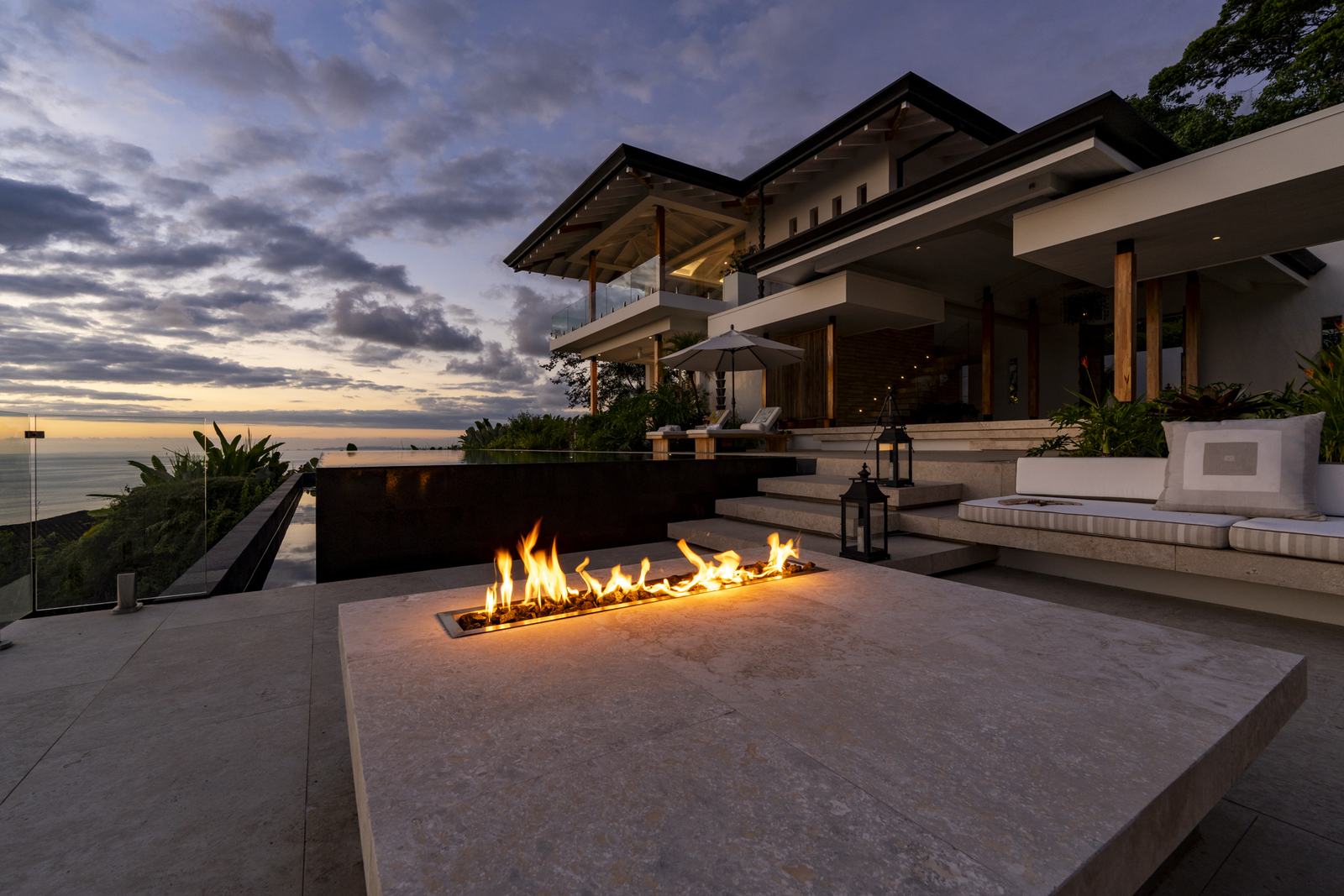 The fire pit on the terrace at dusk