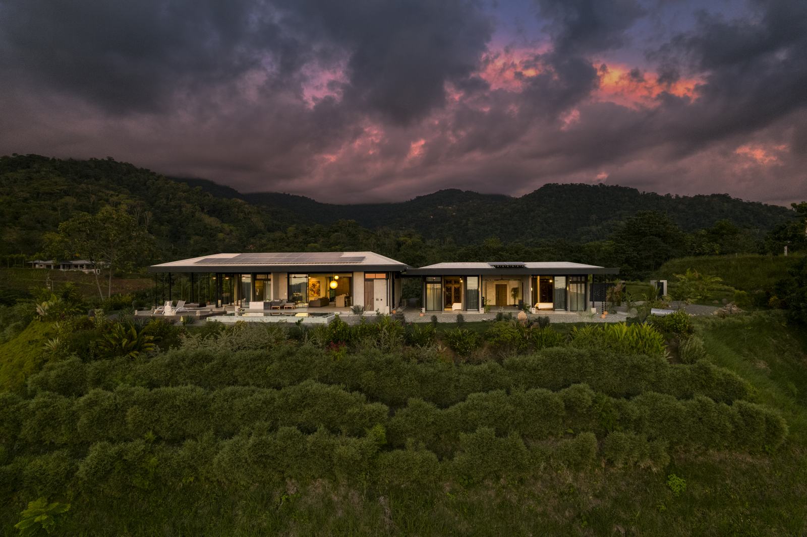 Casa Karuna &mdash; The estate and the valley below at dusk