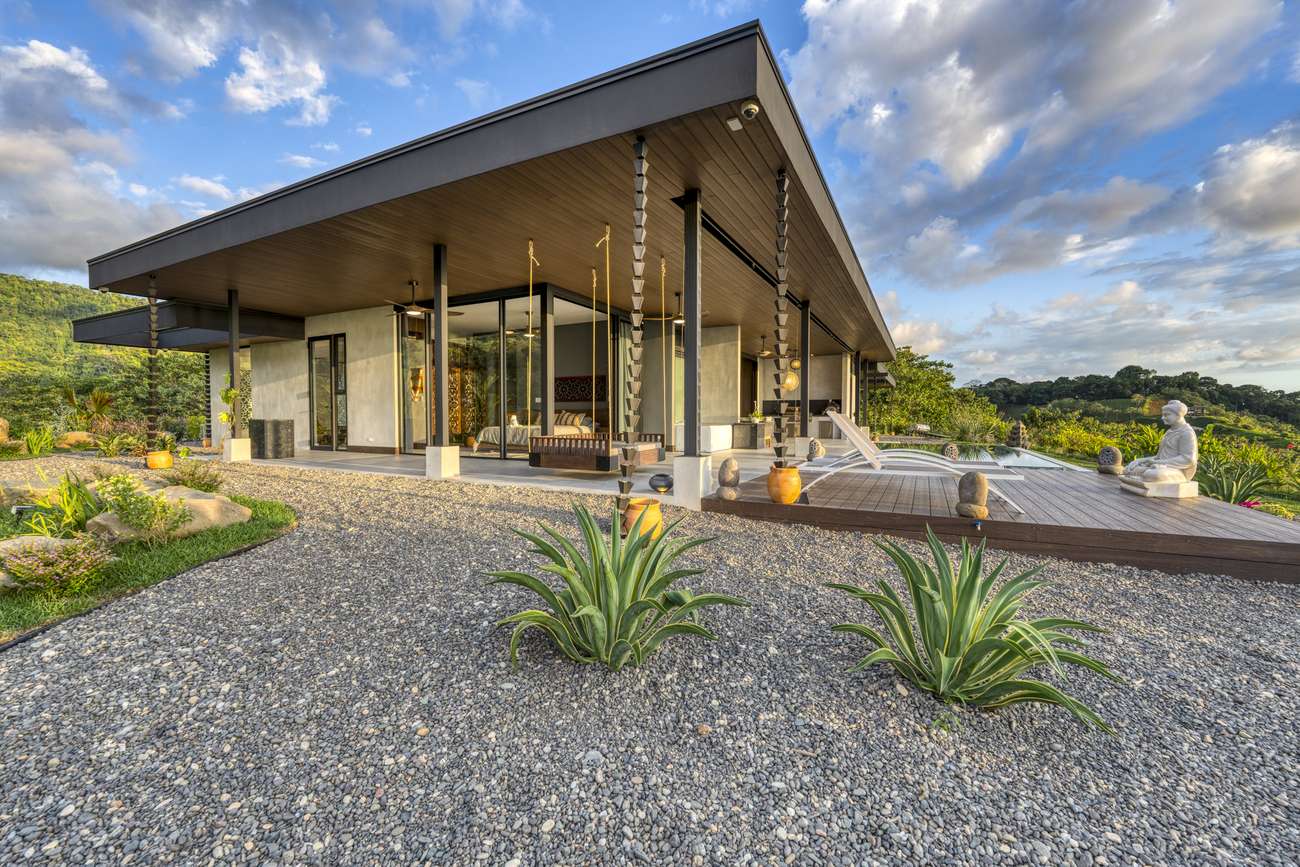 Casa Karuna &mdash; The house from the garden, planted with agave