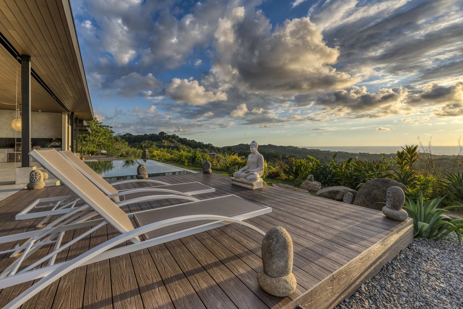 Casa Karuna &mdash; A lounger on the deck as the sun goes down