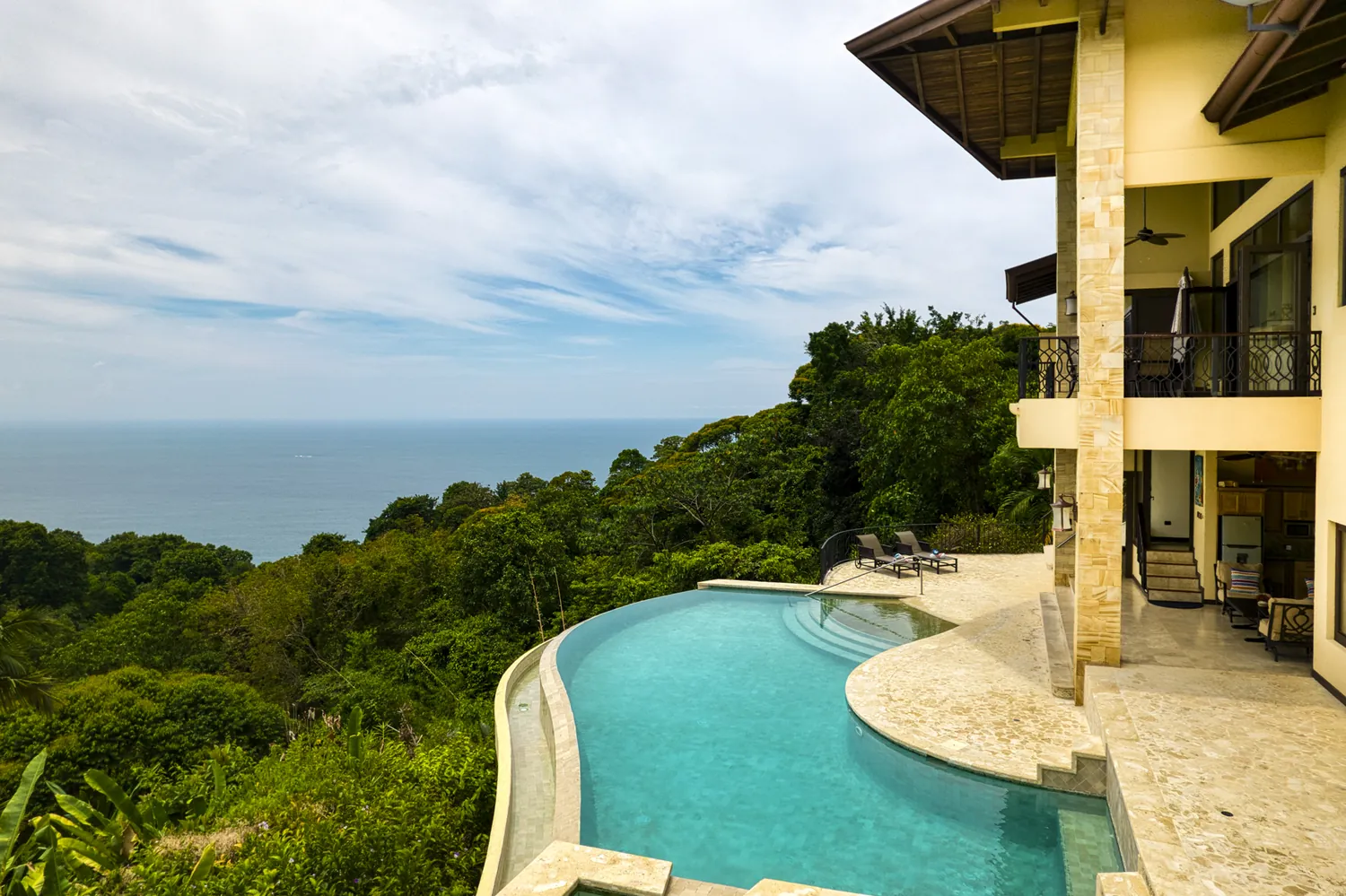 Casa Ladera &mdash; the house standing above its pool