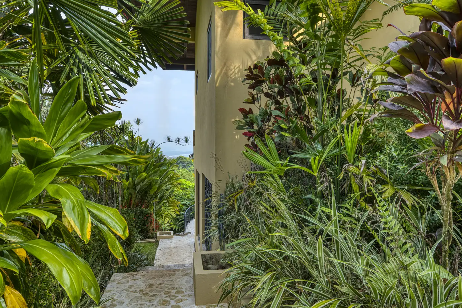 Casa Ladera &mdash; the exterior walkway down to the pool