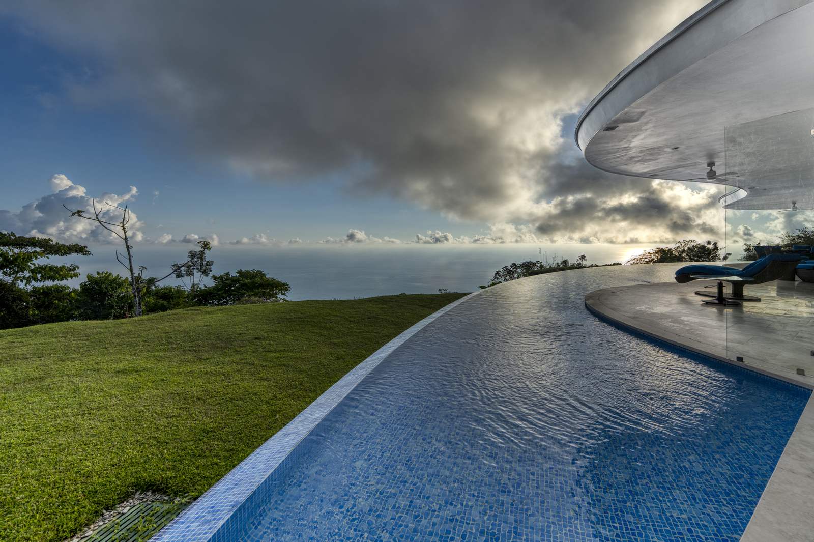 The pool under a breaking sky, storms rolling in off the Pacific