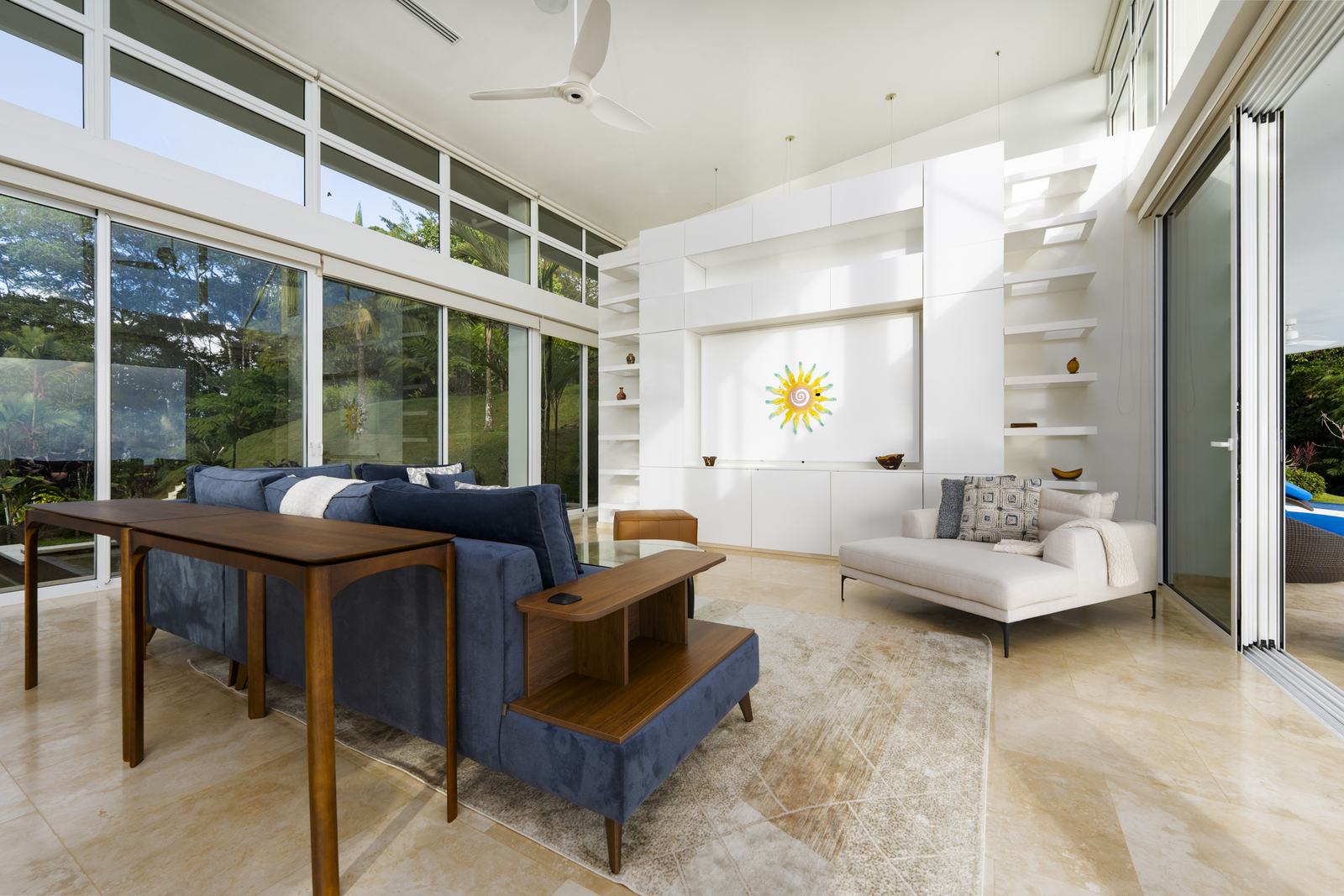 Living and dining together under the raked ceiling