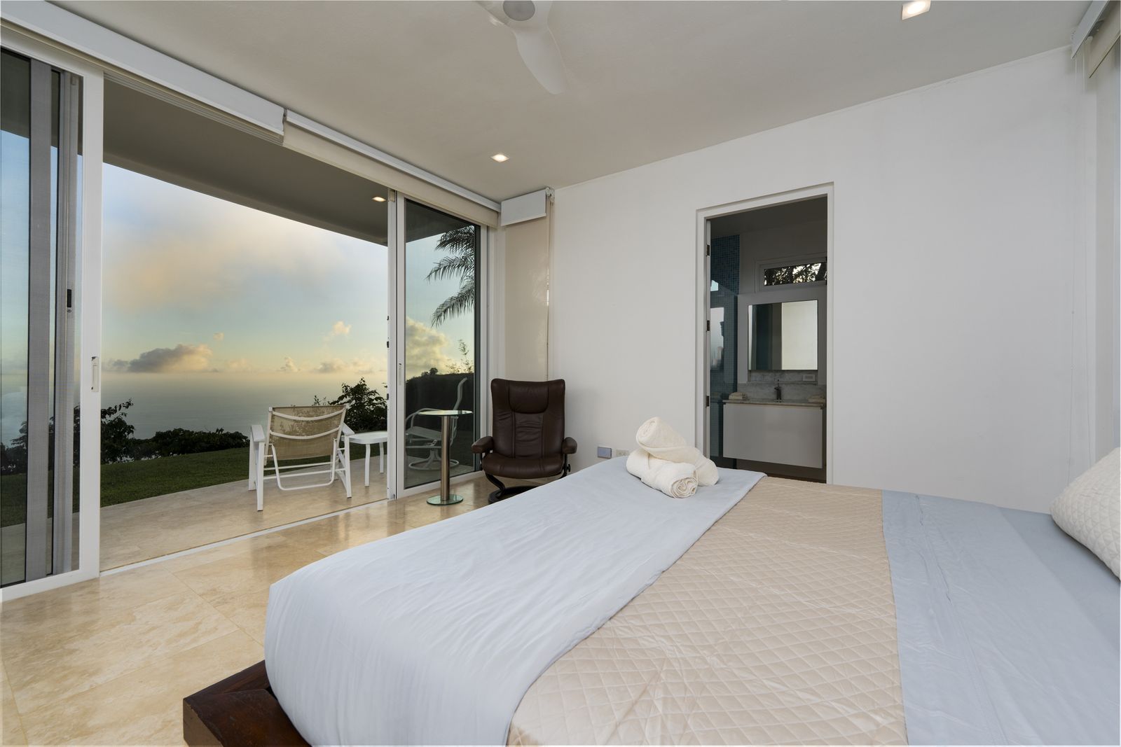 A bedroom opening directly onto the terrace