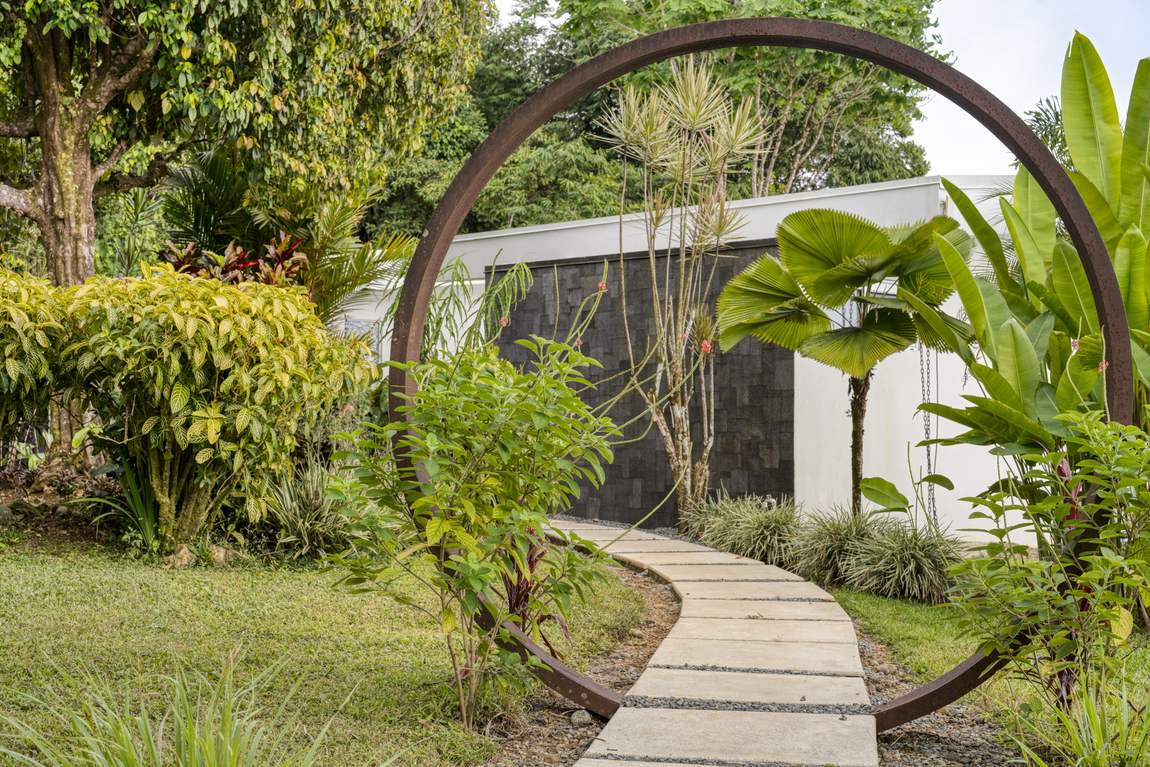 The garden path and moon gate through the planted grounds