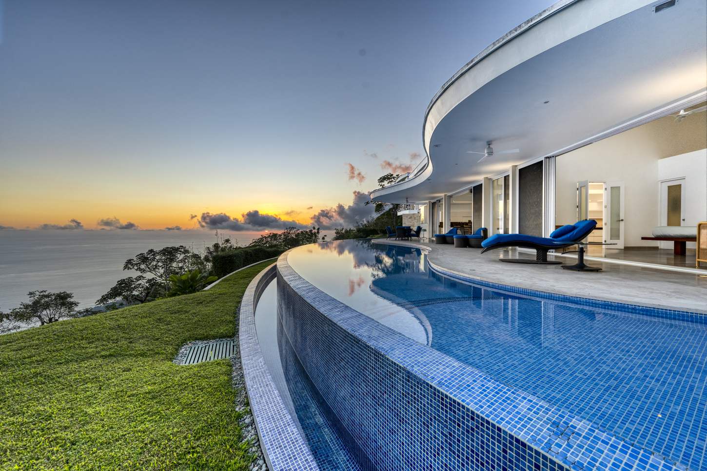 The pool at dusk, curving along the ridge
