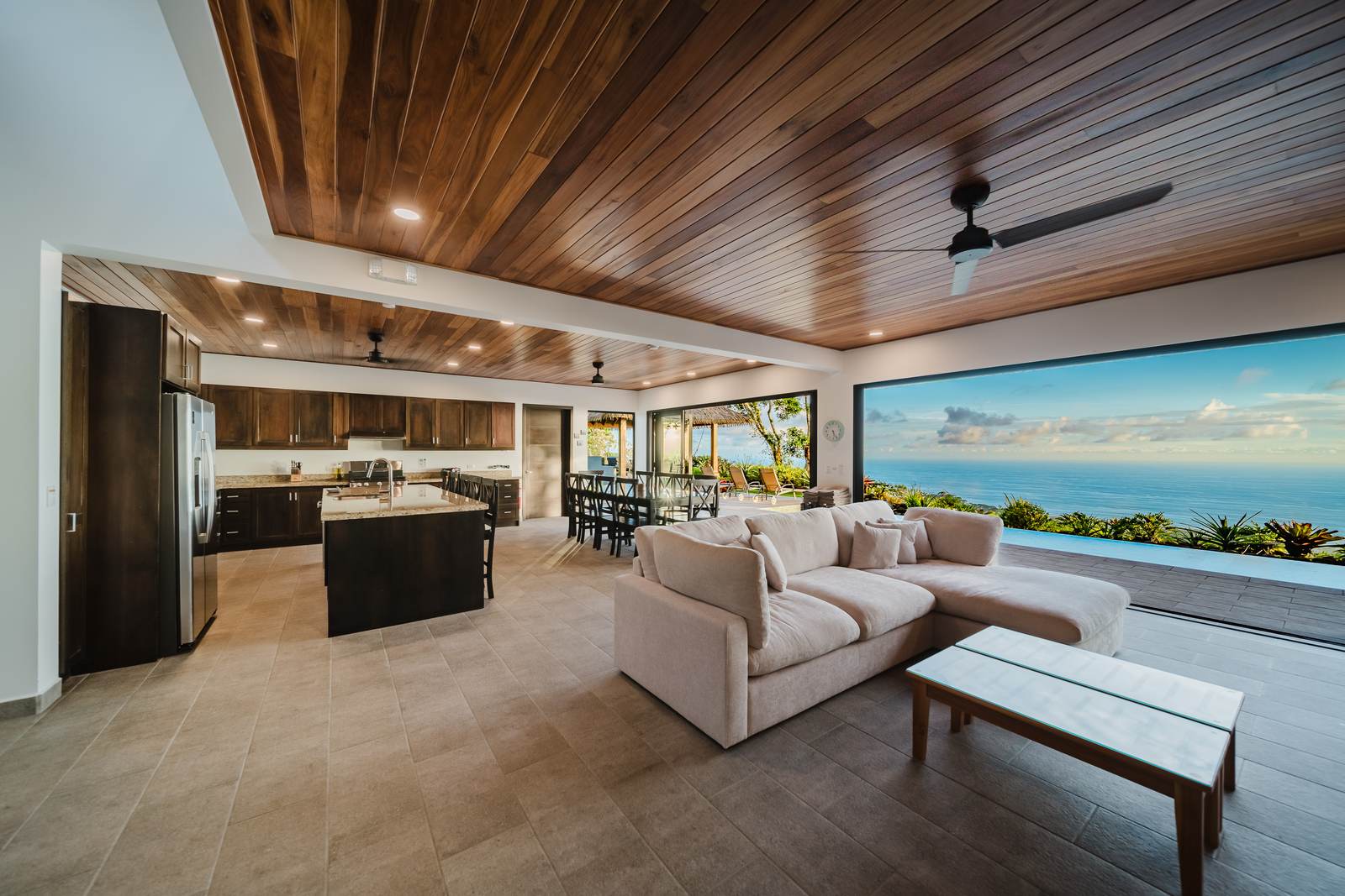 Casa Monta&ntilde;a &mdash; Living and kitchen together under Laurel wood ceilings