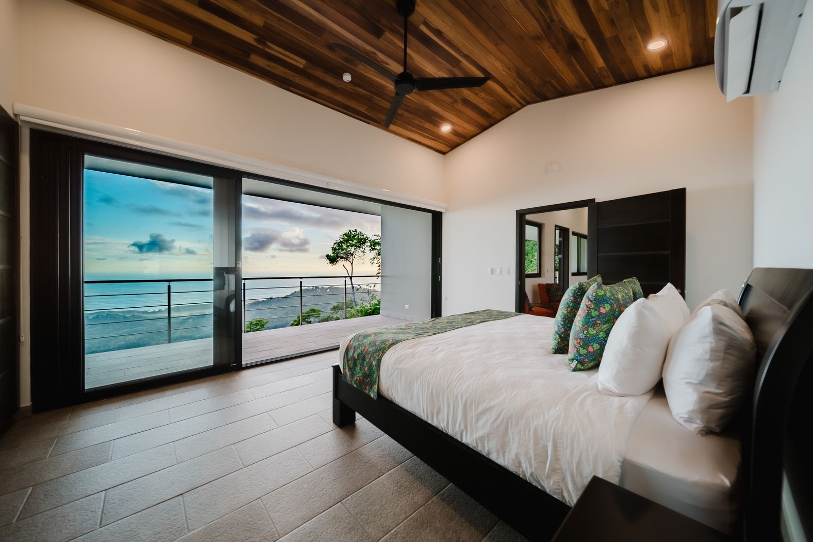 Casa Monta&ntilde;a &mdash; The primary suite, glazed to the ocean
