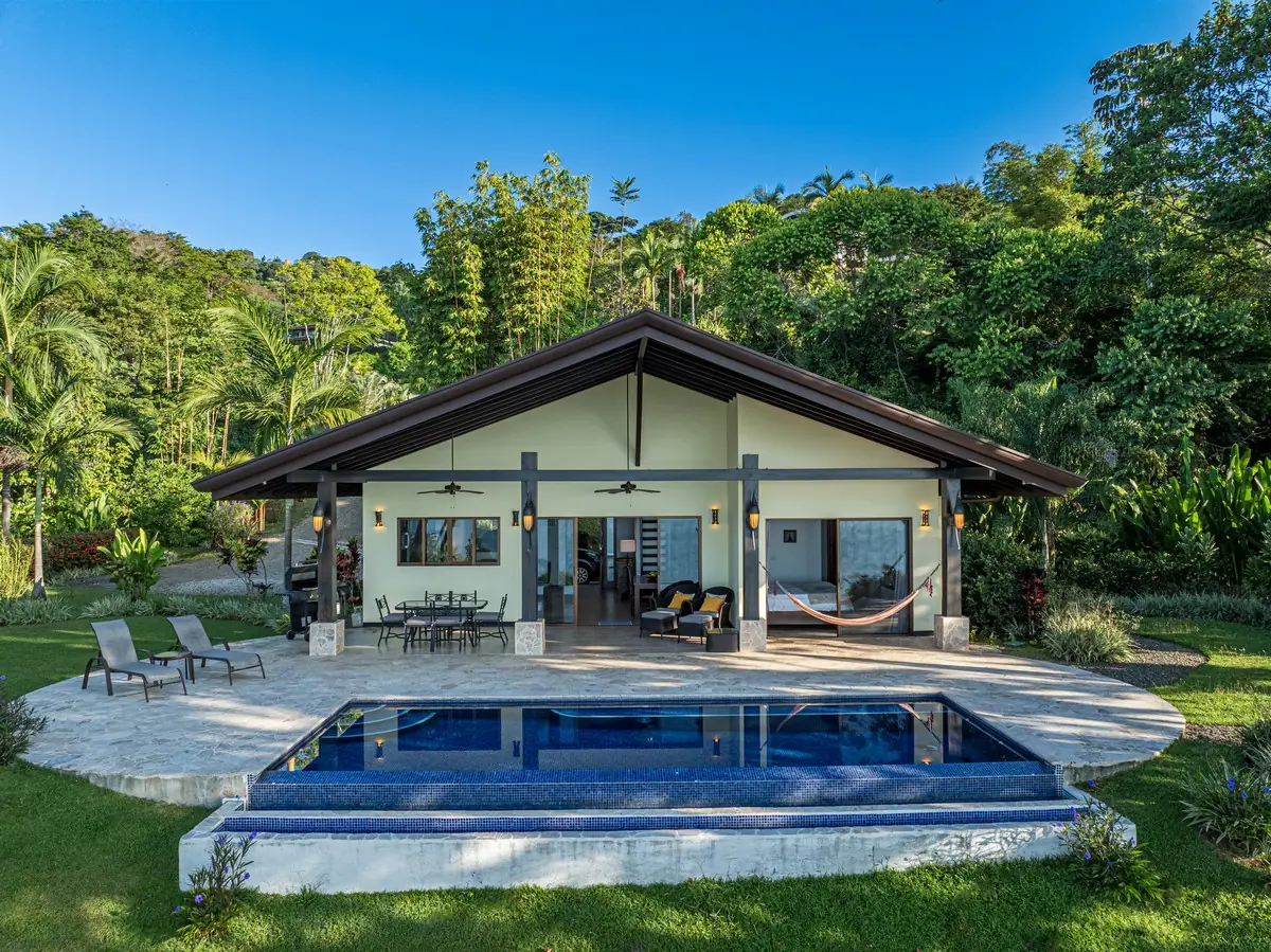Casa Ola Azul &mdash; the house and the pool from the lawn