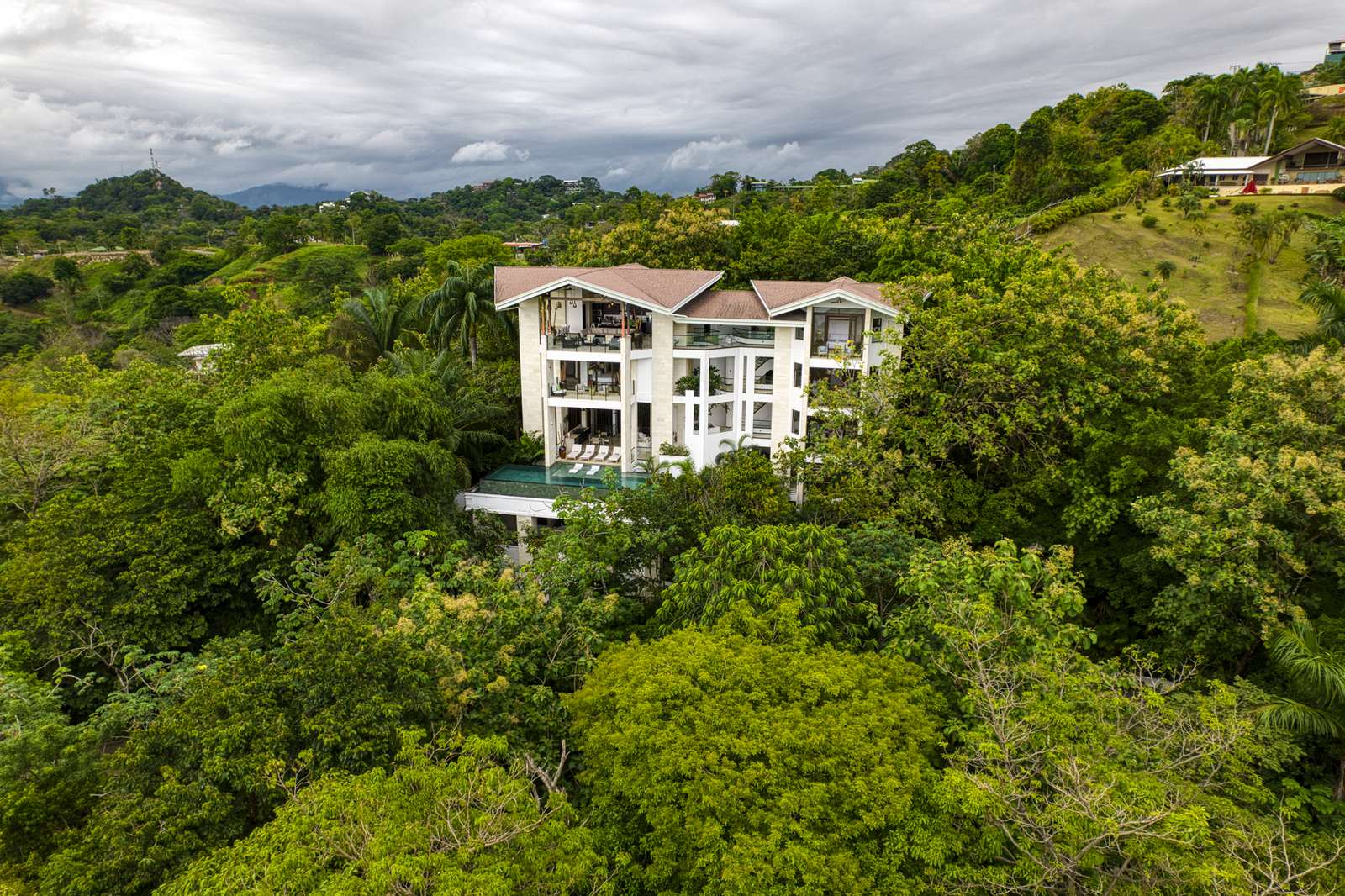 Casa SolAngelo &mdash; the four-story house set into the Tulemar canopy