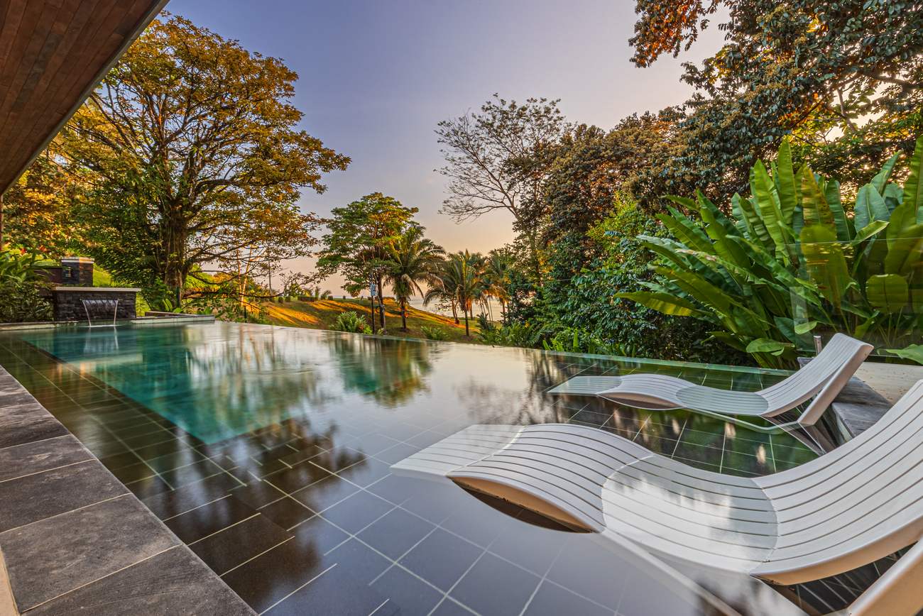 Casa Tango &mdash; Loungers at the pool's edge above the canopy