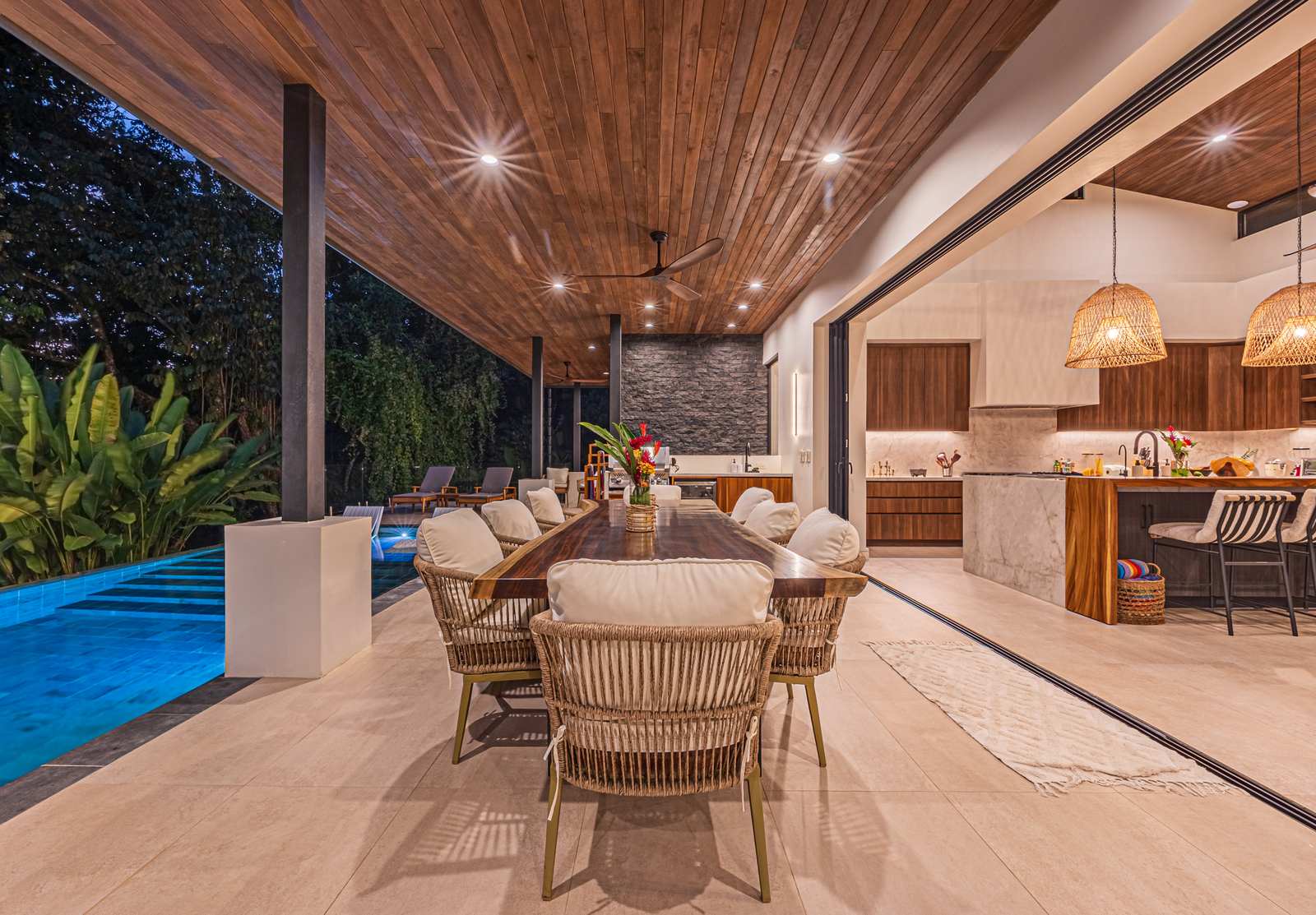 Casa Tango &mdash; The terrace at dusk, lit from the house