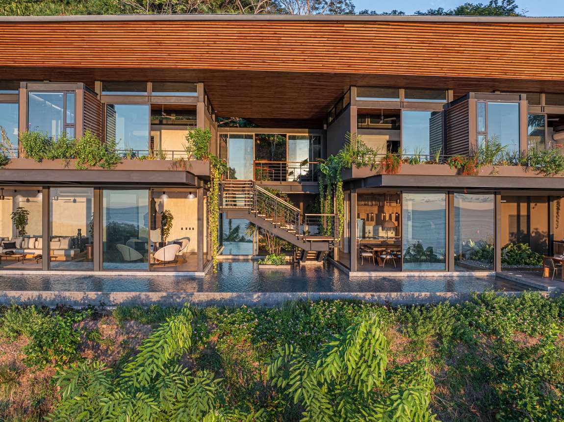 Cascada de Luz &mdash; The full elevation, teak louvers running its length