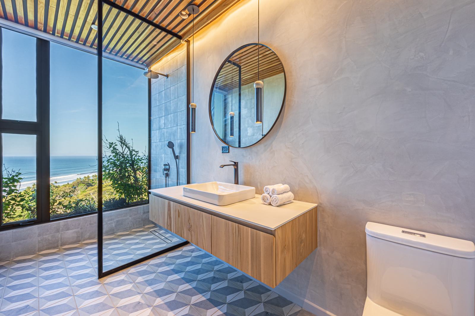 Cascada de Luz &mdash; A vanity with the ocean beyond