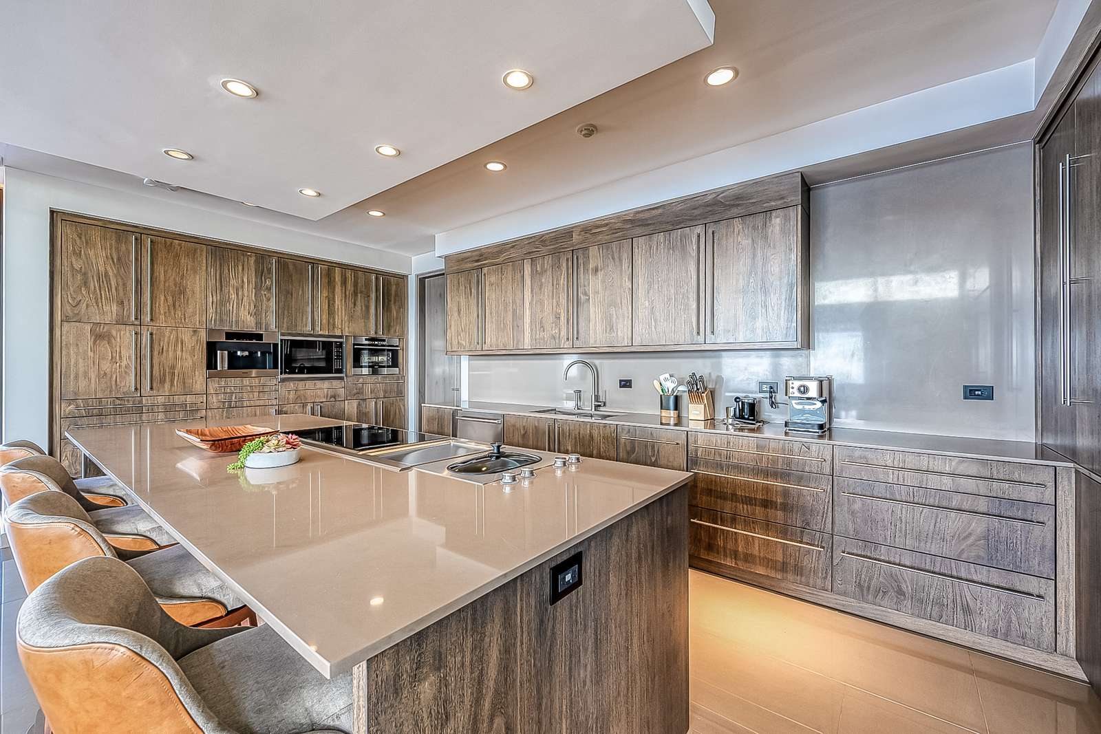 The kitchen island and bar seating