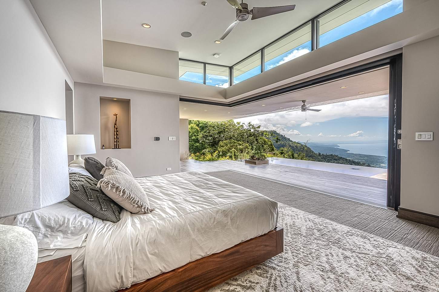 A bedroom opening directly to the view