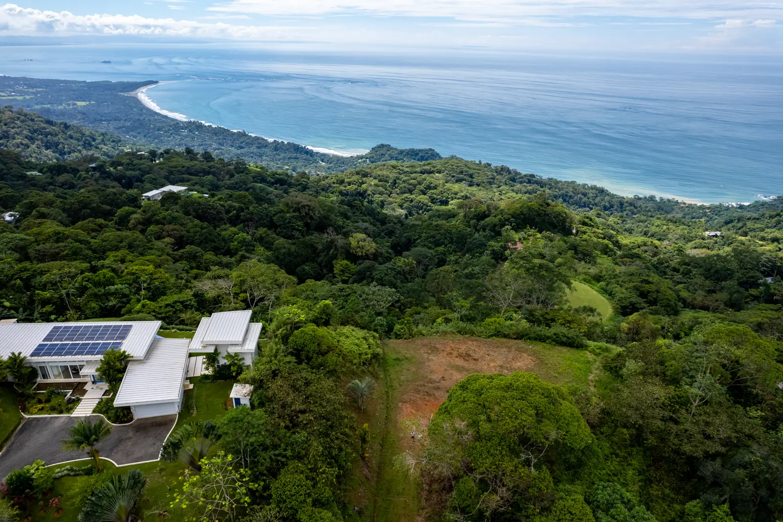 Neighboring homes at Costa Verde Estates sitting above the coastline