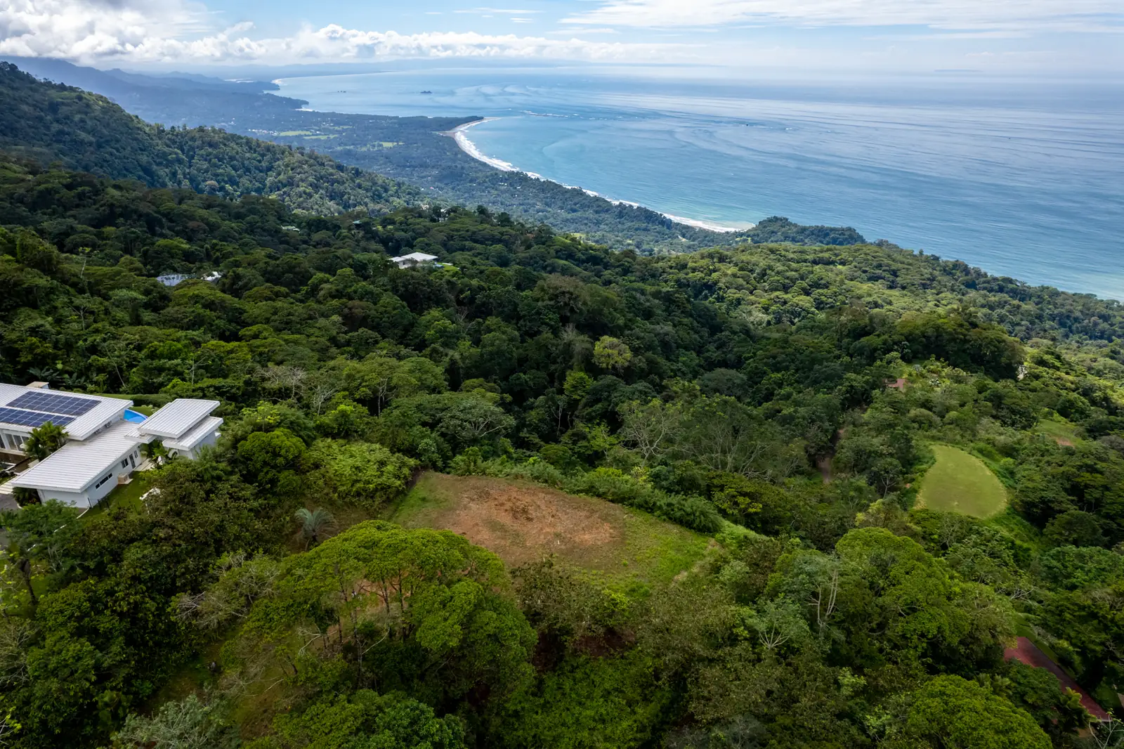 The coastline from the ridge at Costa Verde Estates, beach and ocean below