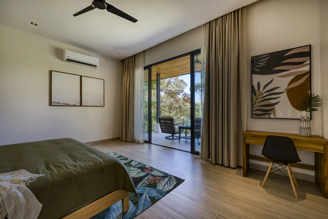 Dulce Pac&iacute;fico &mdash; a bedroom opening to the terrace