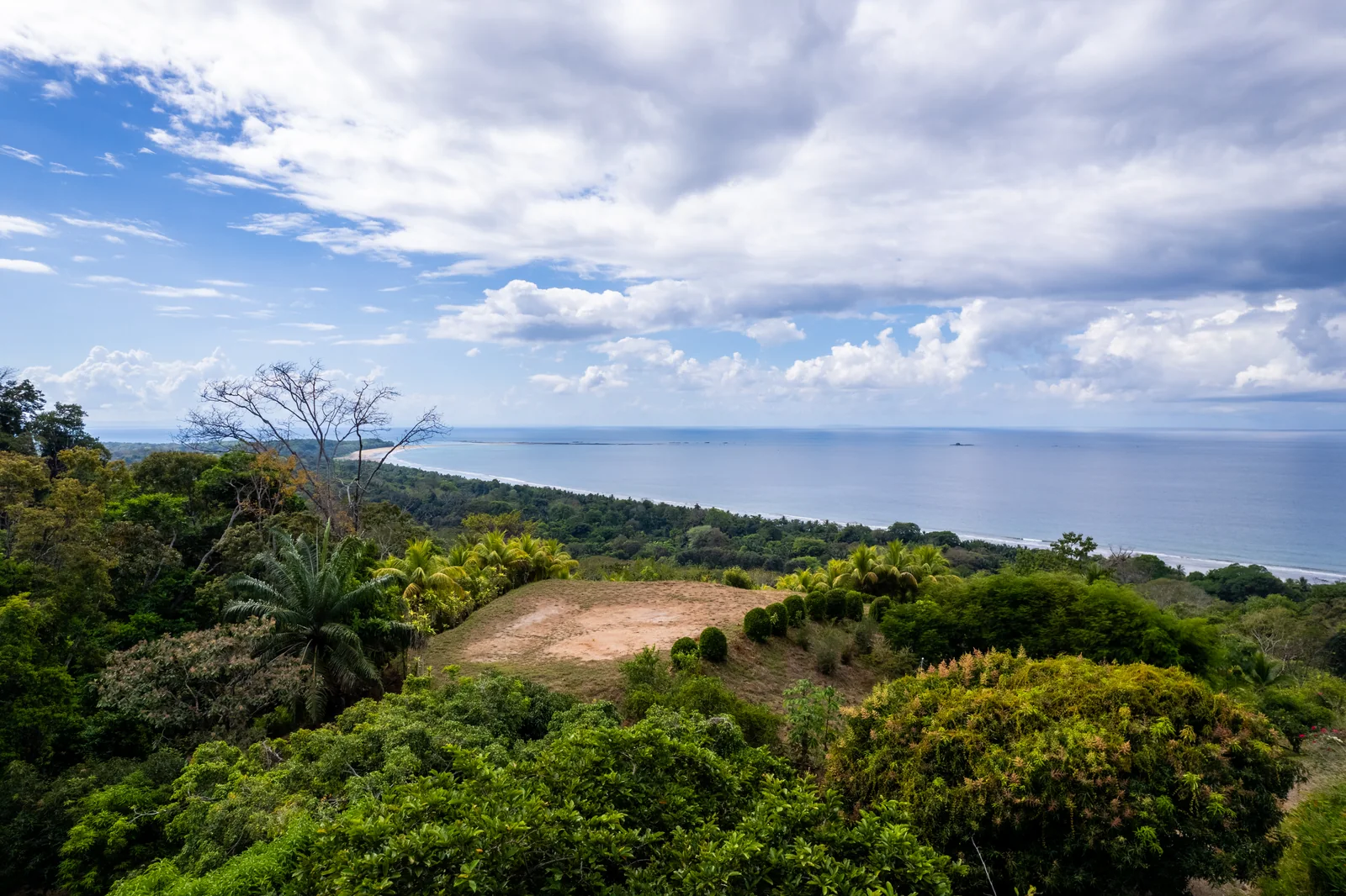 Finca La Cascada &mdash; cleared ground on the ridge, facing the ocean above Playa Hermosa