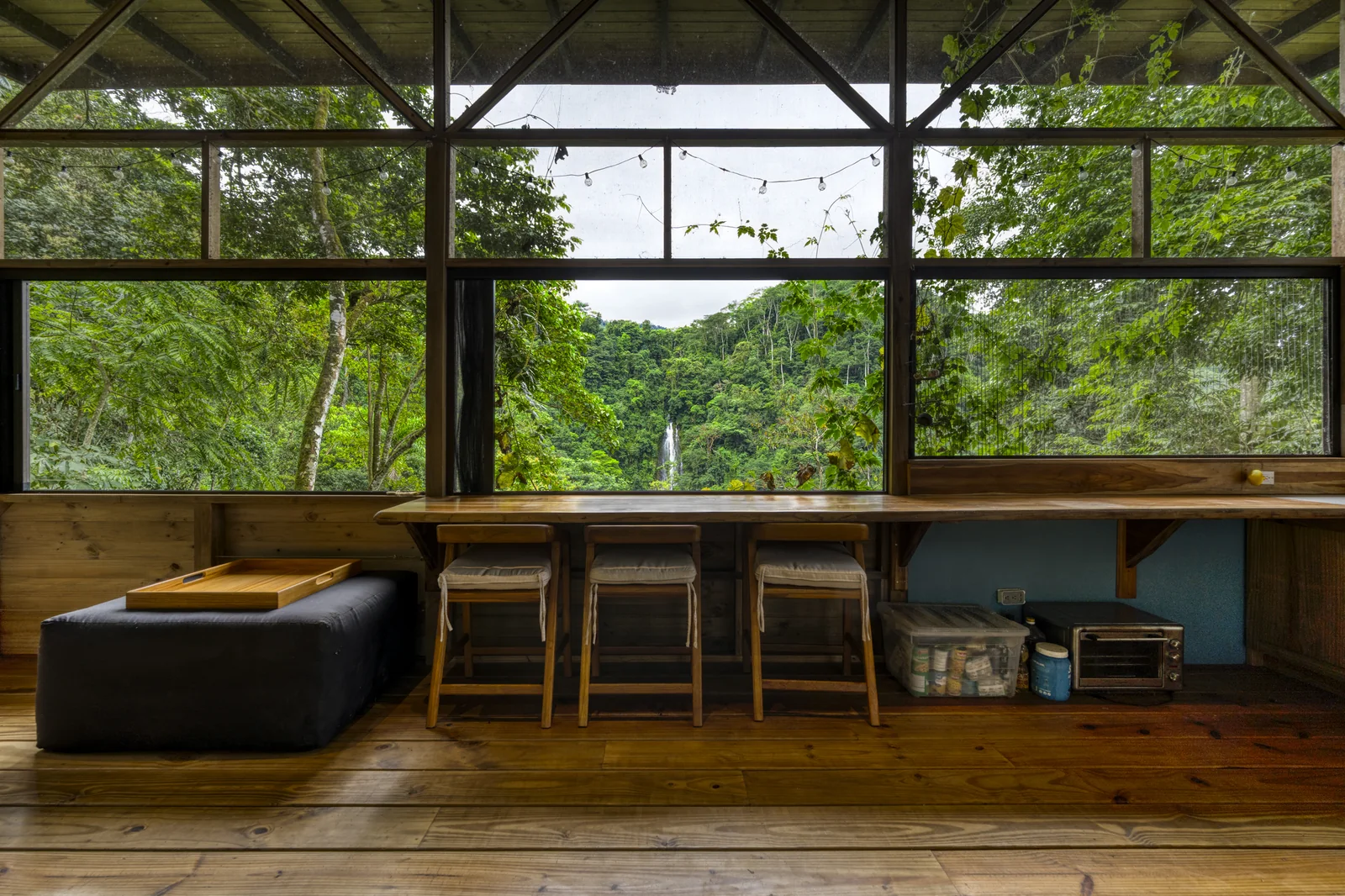 Finca Tres Cascadas &mdash; the cabin, open along its jungle side