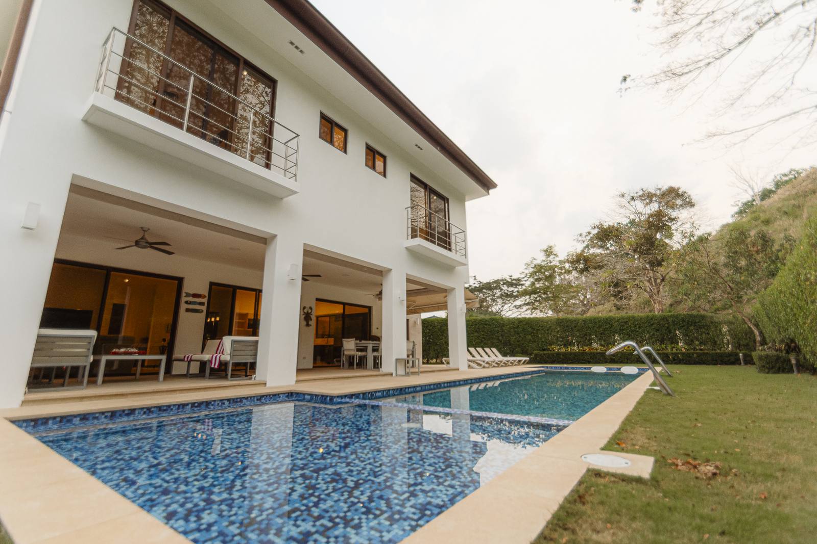 La Estancia &mdash; The house and its lap pool, seen across the lawn