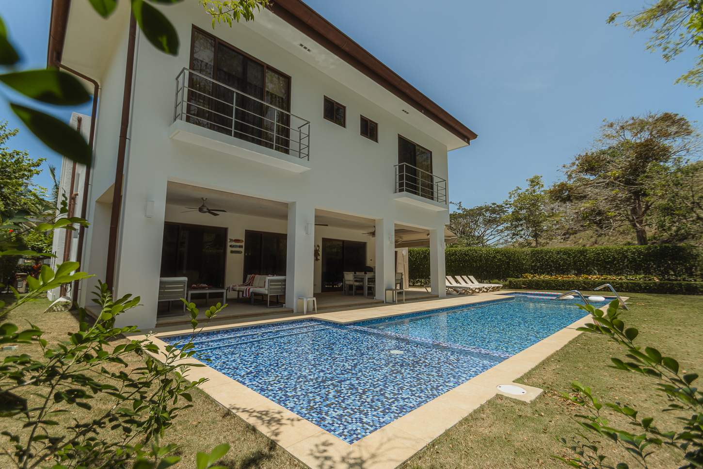 La Estancia &mdash; The house and pool from the hedged garden