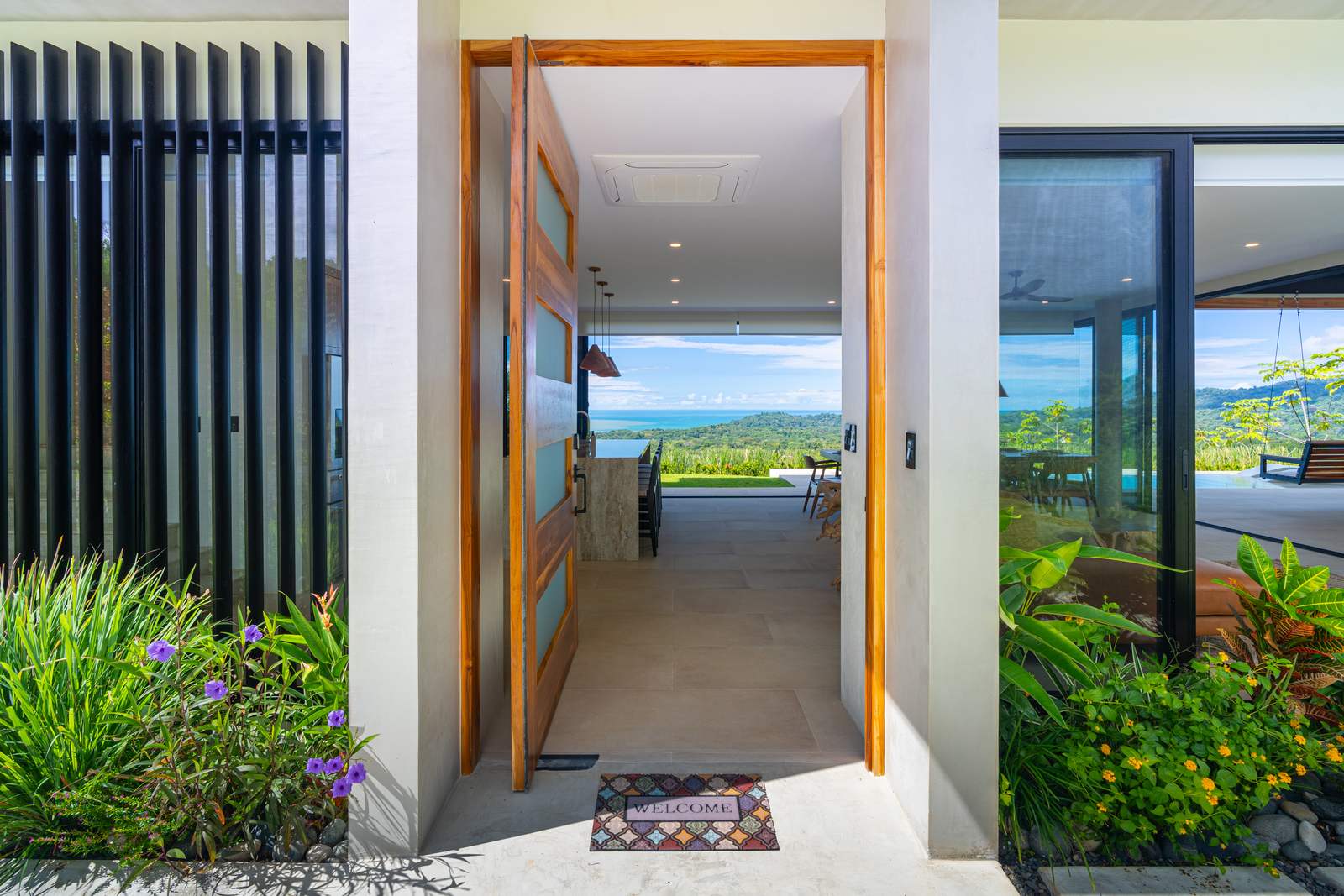 Modern Glass Estate &mdash; The outdoor kitchen and grill on the terrace