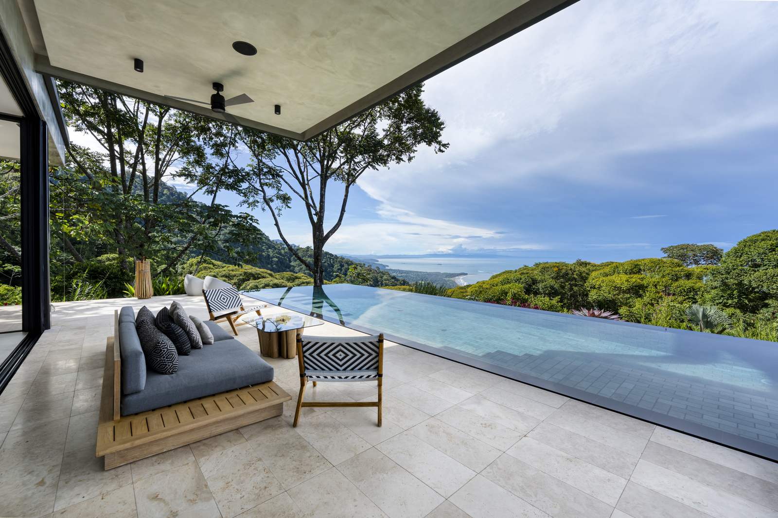 &iexcl;Que Brava! &mdash; the pool terrace, its infinity edge open to the coast