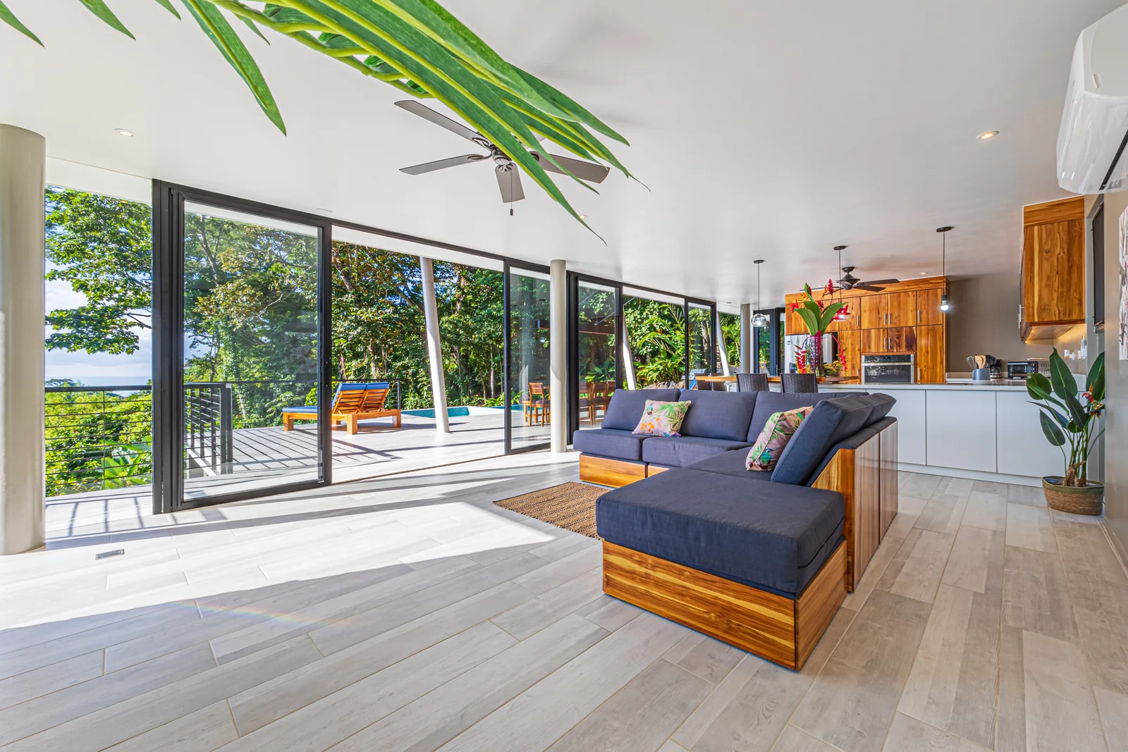 Villa las Ramas &mdash; the living room, opened along its whole length to the terrace