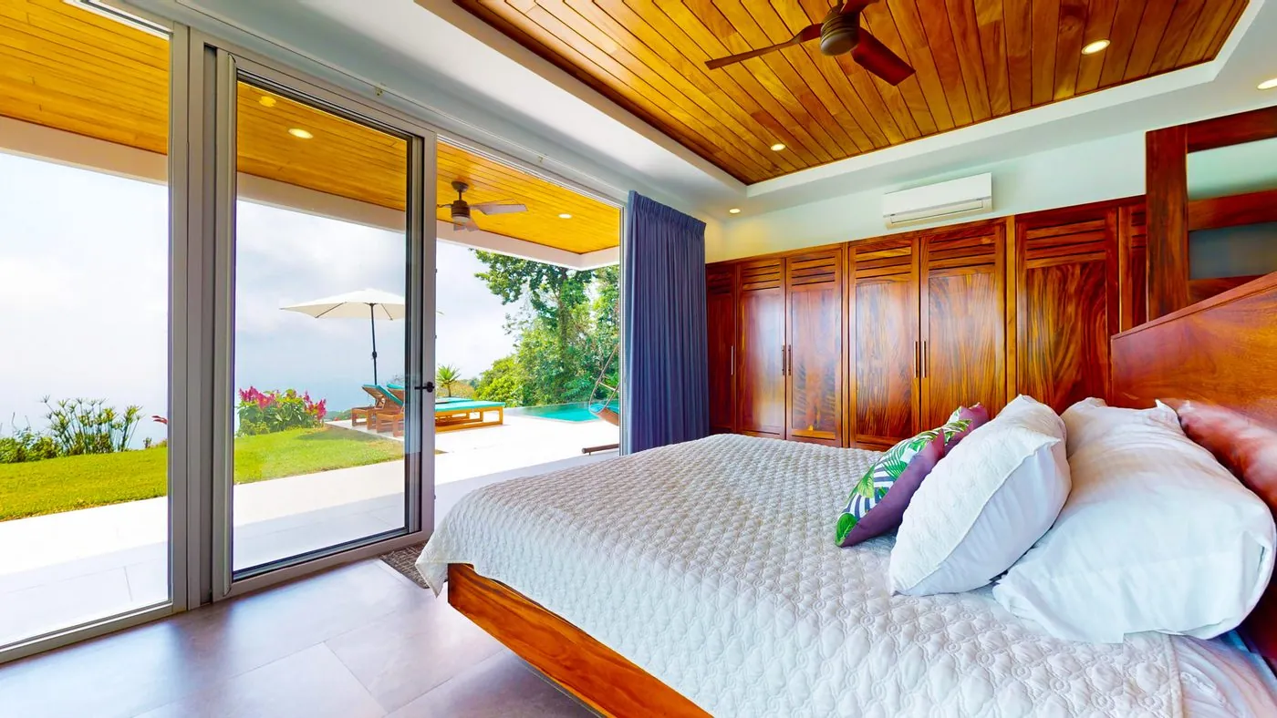 Villa Oro Verde &mdash; a bedroom opening onto the pool terrace