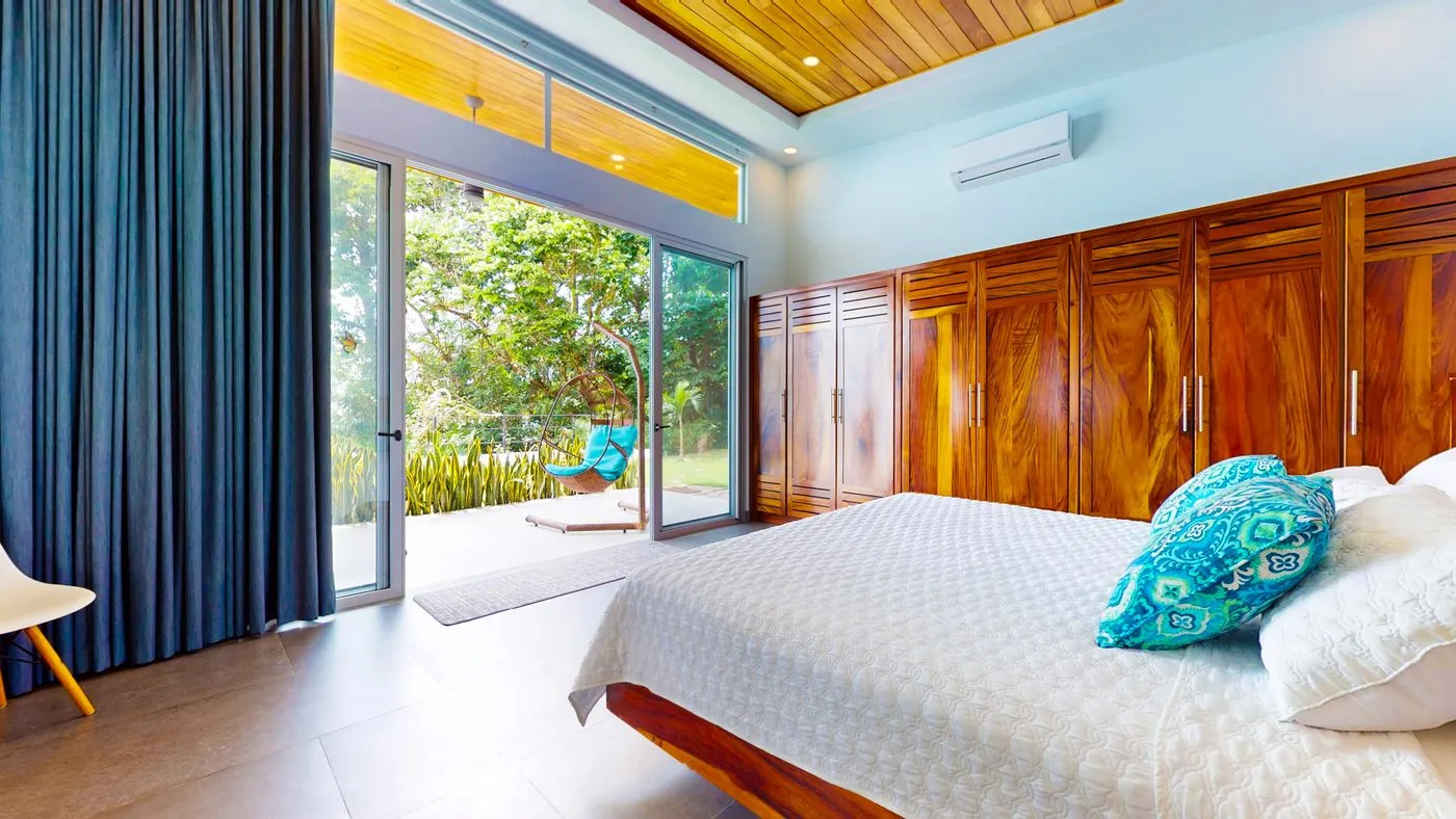 Villa Oro Verde &mdash; a guest bedroom with direct garden access