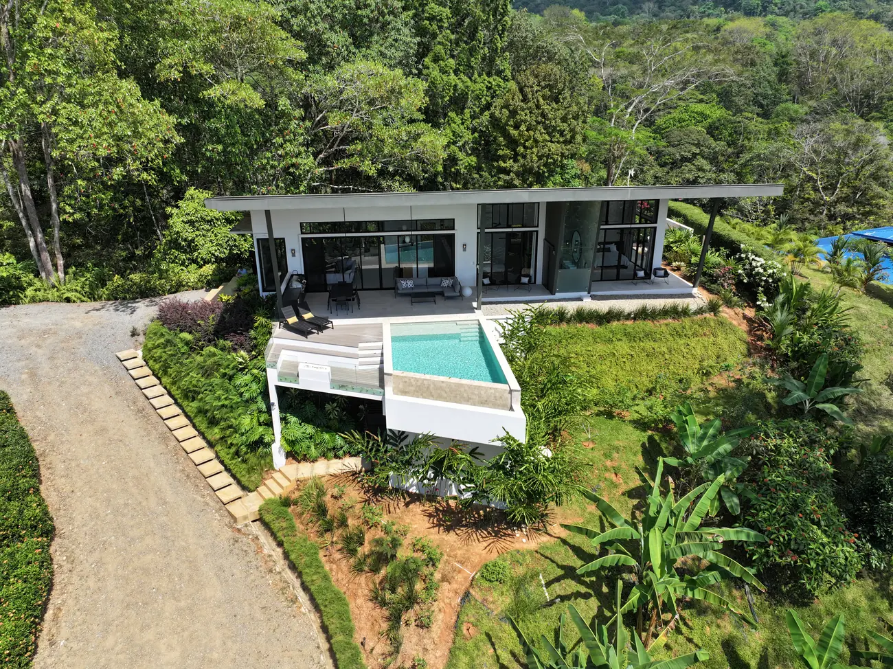 Vista Hermosa &mdash; the house and pool from the air, on its ridge above Ojochal