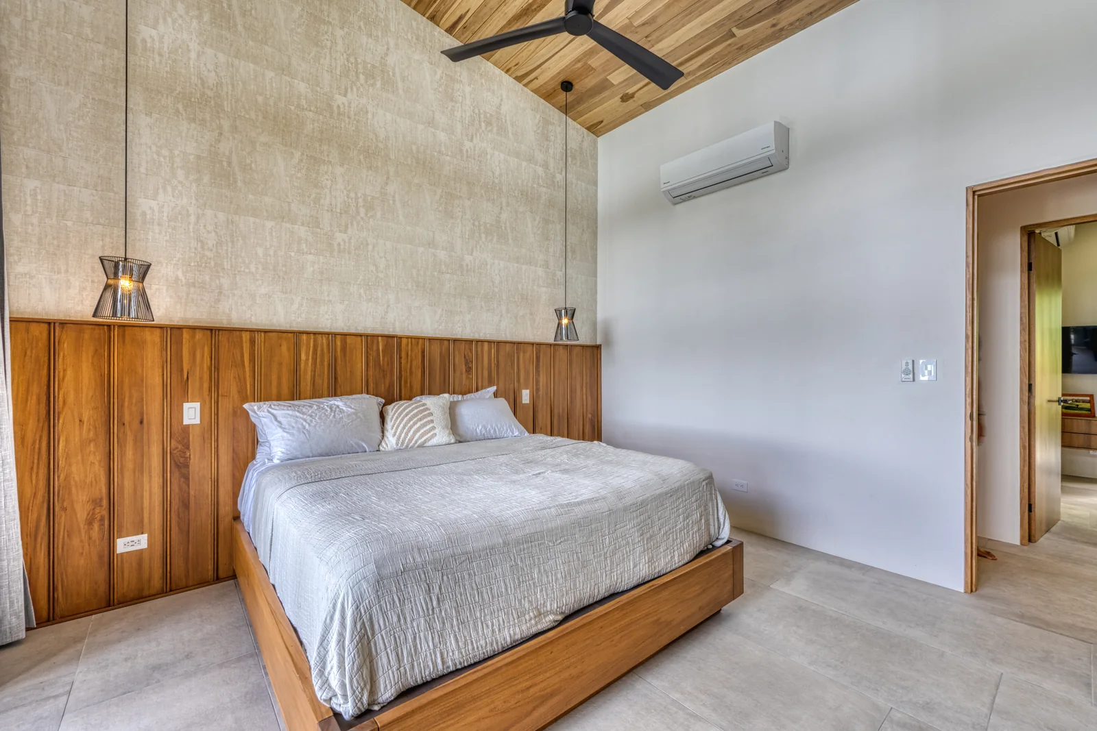Vista Hermosa &mdash; the master suite, panelled in hardwood