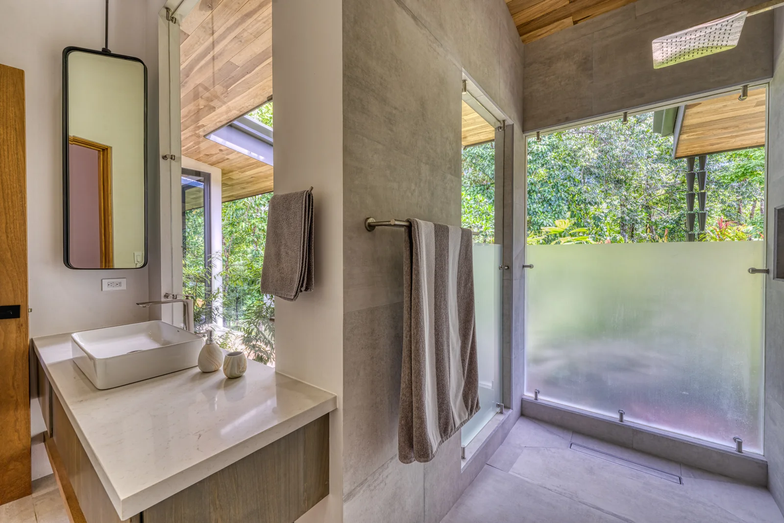 Vista Hermosa &mdash; the vanity, with the garden beyond the glass