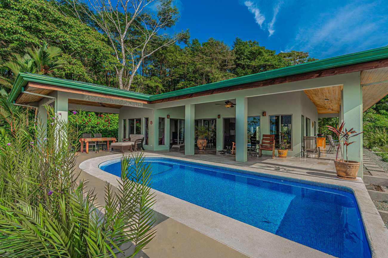 The pool running the length of the house