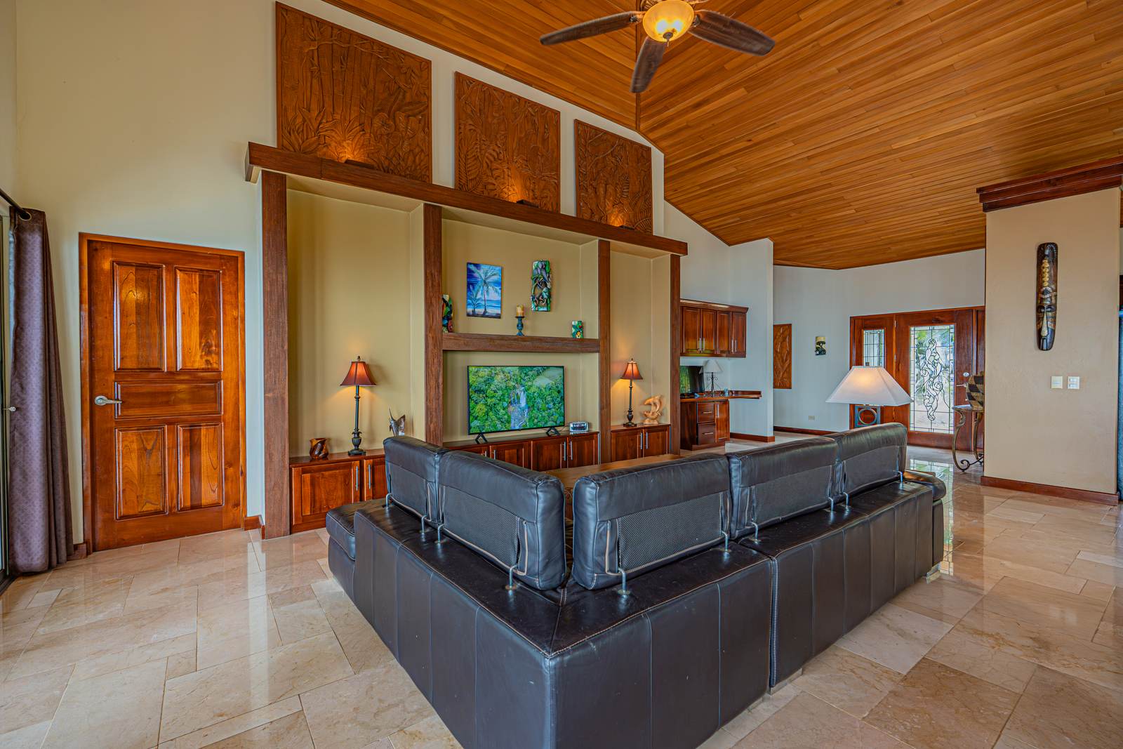 The main living room, under wood ceilings