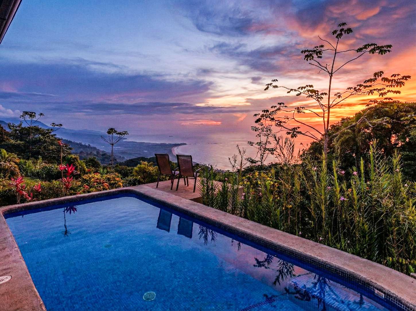 The Whale's Tail View Estate — the pool at sunset, looking down the coast